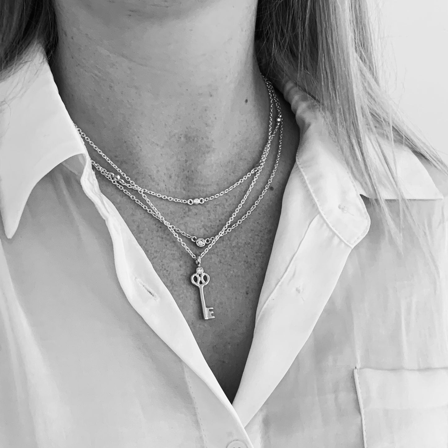 Key Pendant with 3mm, 0.10ct. Diamond
