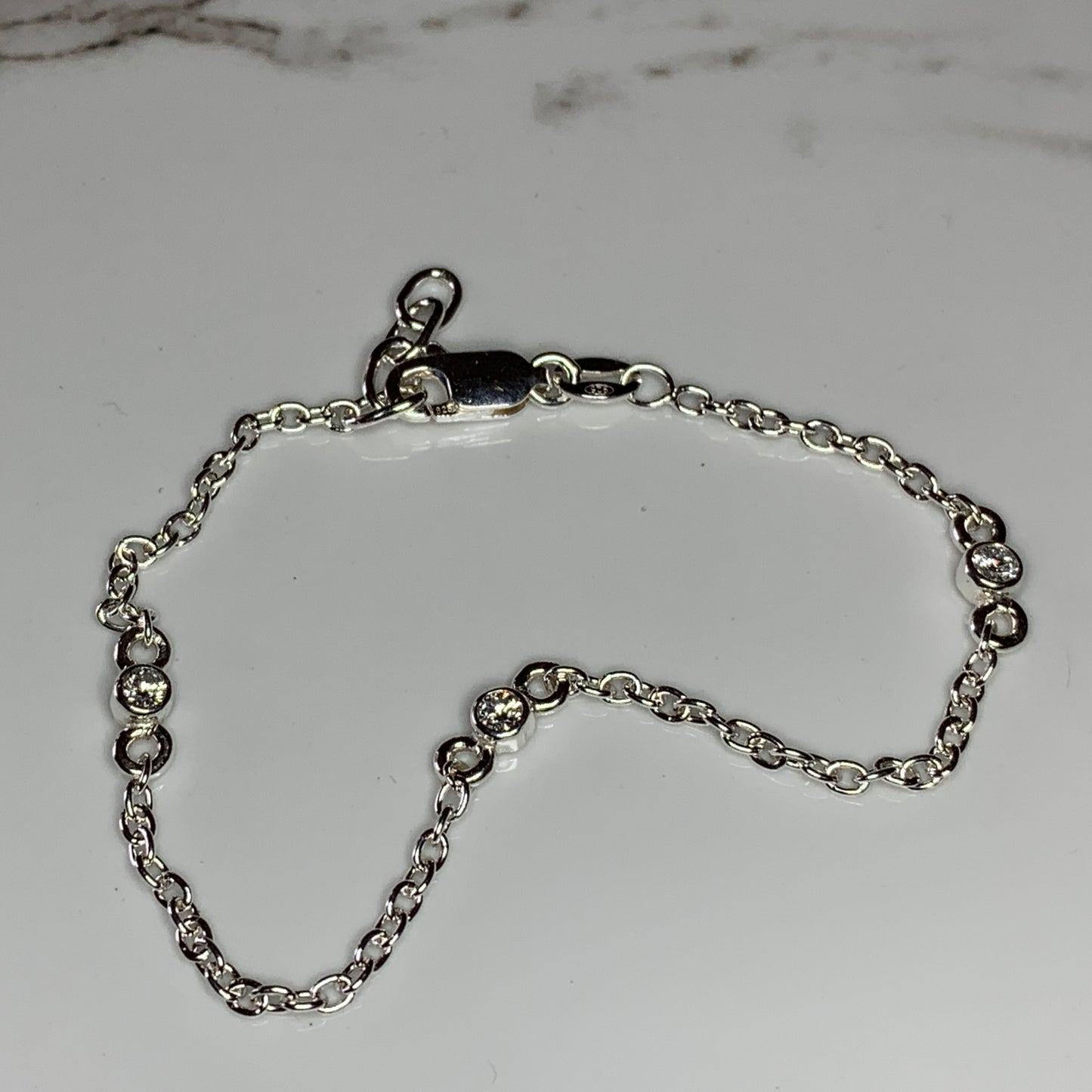 Trilogy Bracelet inset with 3x2.5mm, 0.06ct. Diamonds