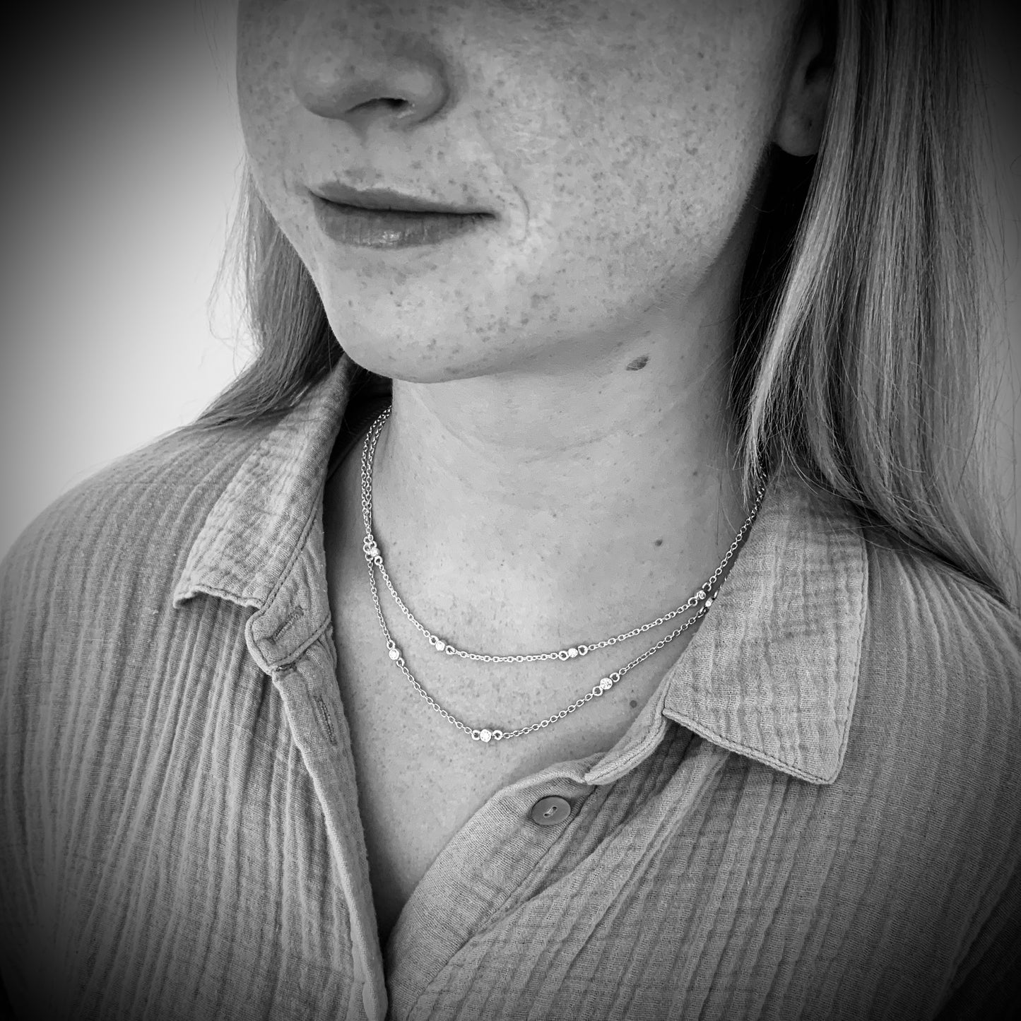 Necklace with 5x3mm, 0.10ct. Diamonds.