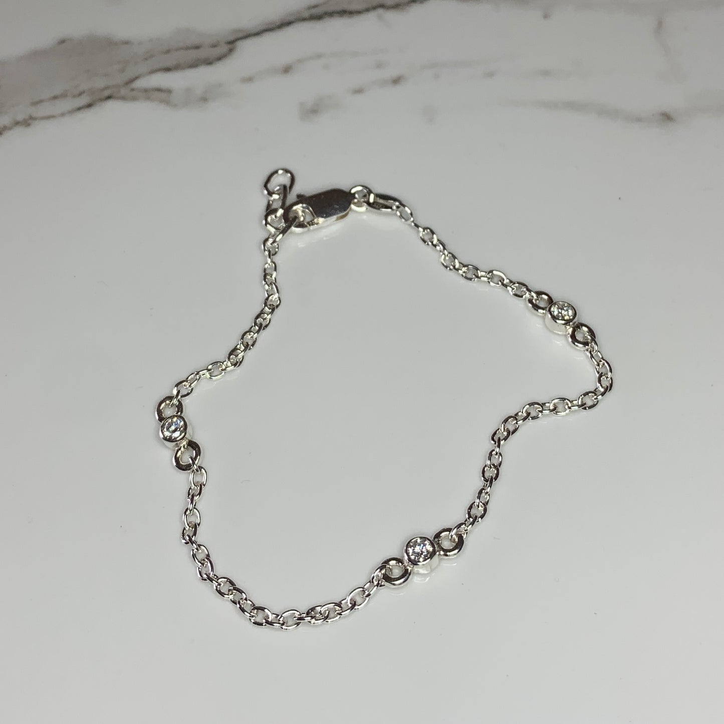 Trilogy Bracelet inset with 3x2.5mm, 0.06ct. Diamonds