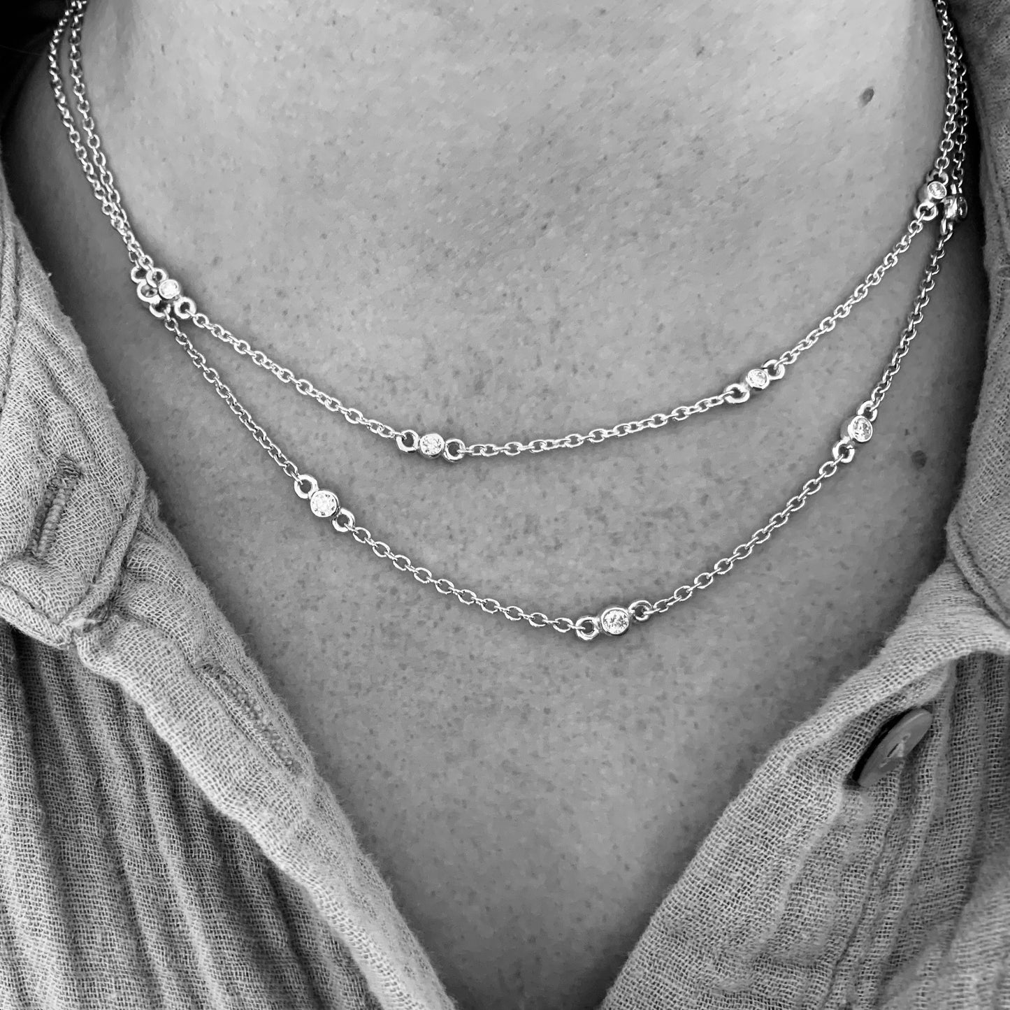 Necklace with 5x3mm, 0.10ct. Diamonds.