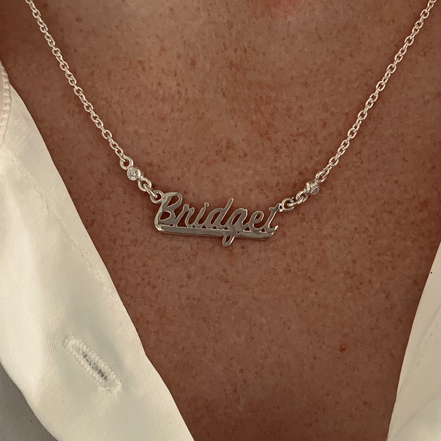 Name Chain framed with 2x2.5mm, 0.06ct. Diamonds.