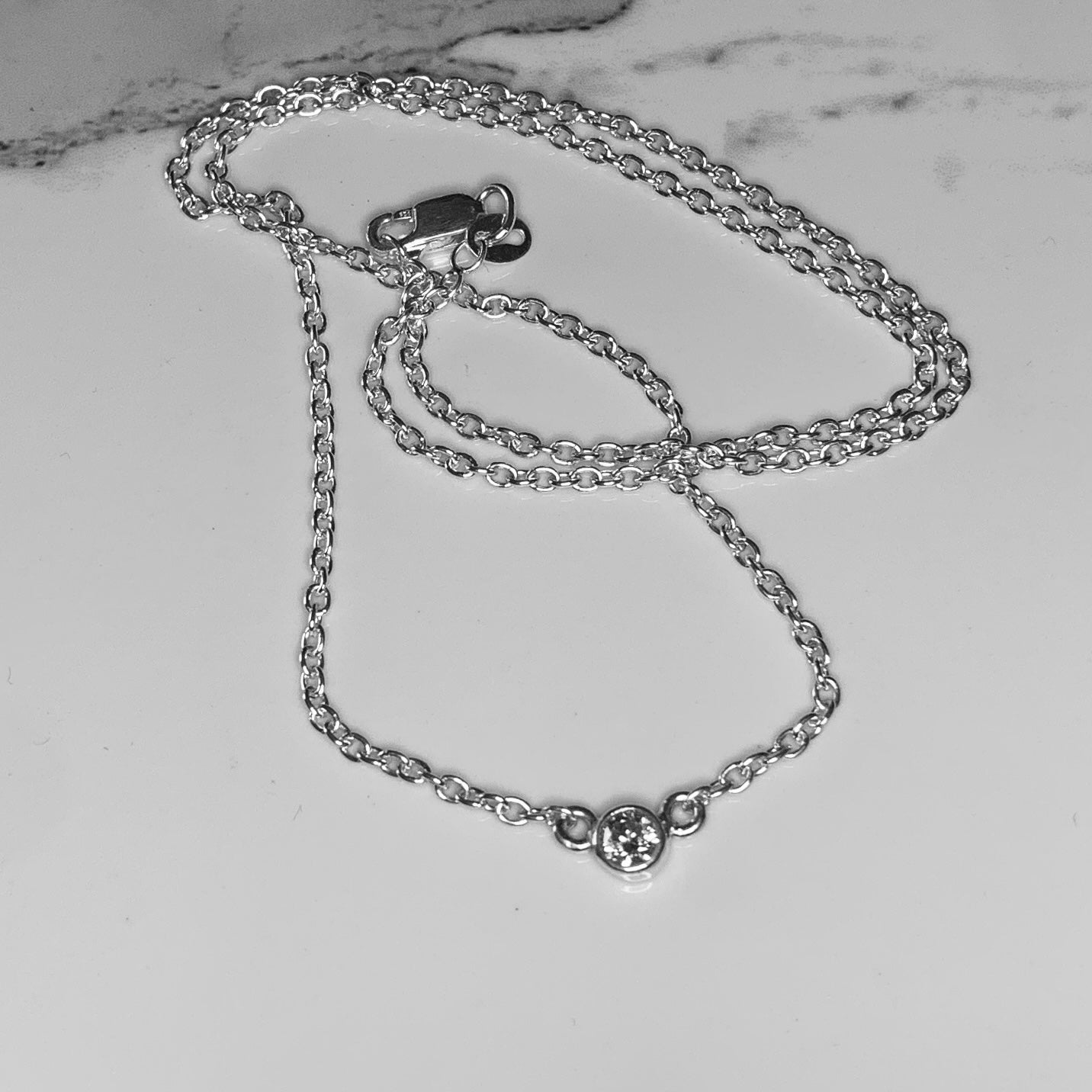 Solitaire Necklace with 4mm, 0.25ct. diamond