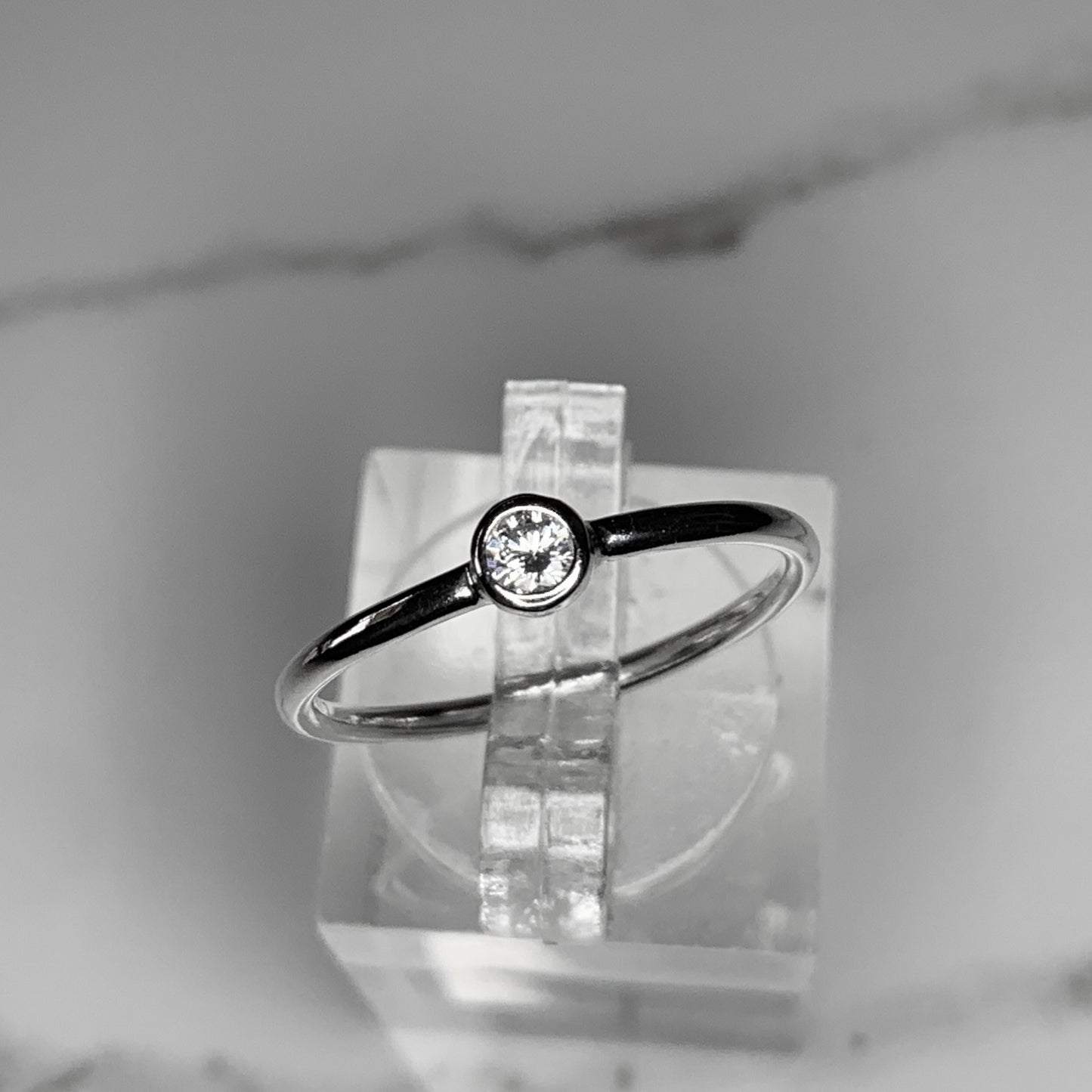 Solitaire Ring with 3mm, 0.10ct. Bezel set Diamond
