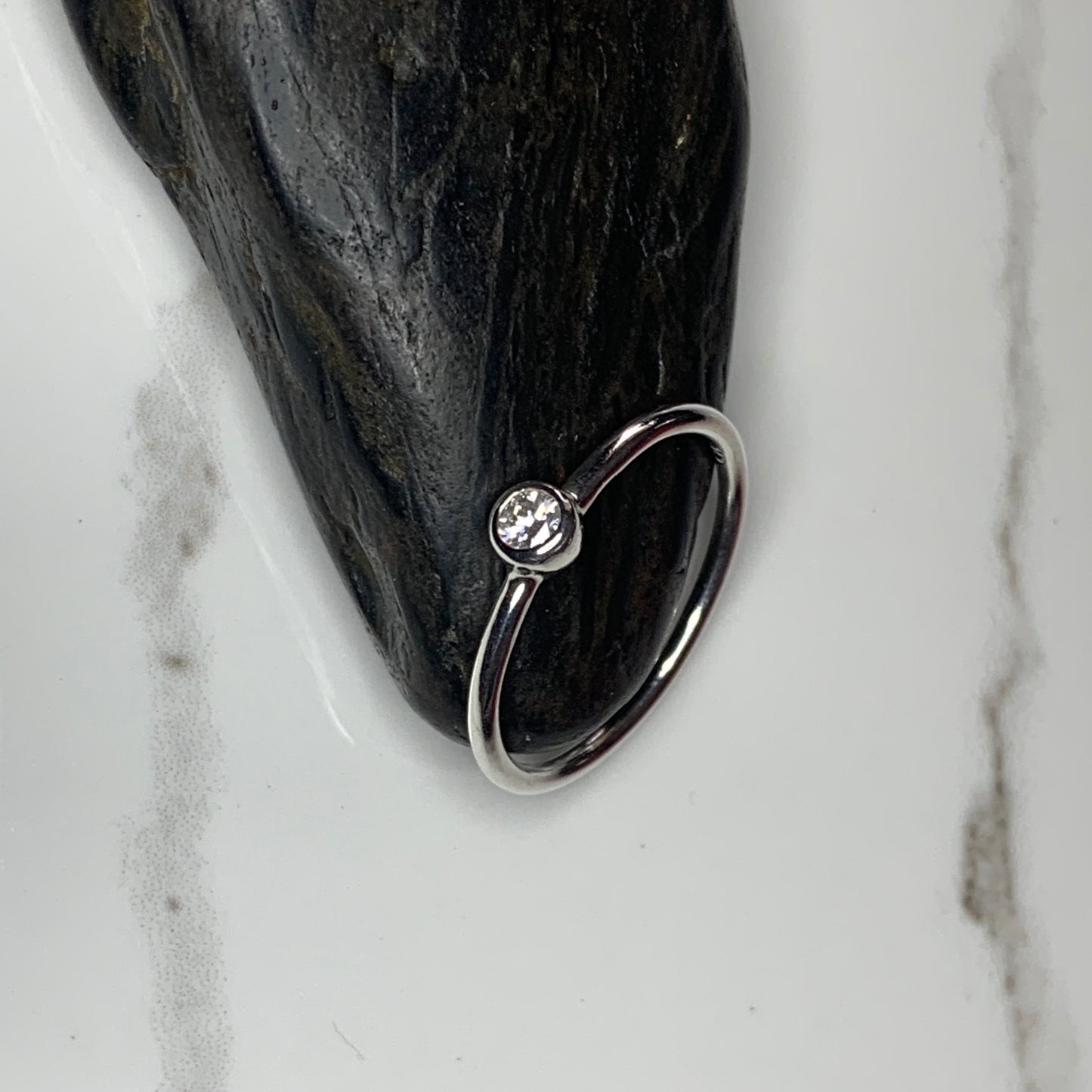 Solitaire Ring with 3mm, 0.10ct. Bezel set Diamond