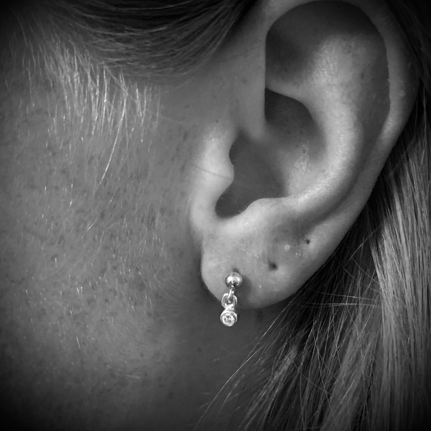 Petite Drop Earring with 2.5mm, 0.06ct. Diamonds.