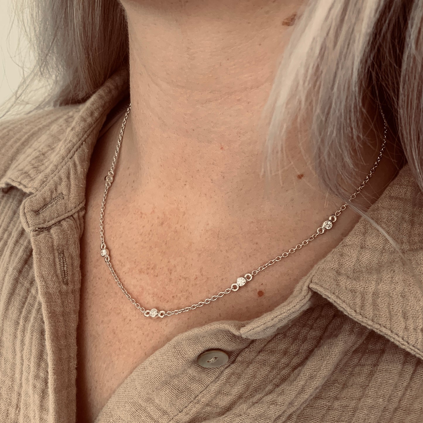 Necklace with 5x3mm, 0.10ct. Diamonds.