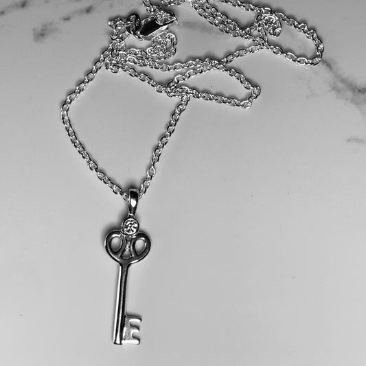 Key Pendant with 3mm, 0.10ct. Diamond