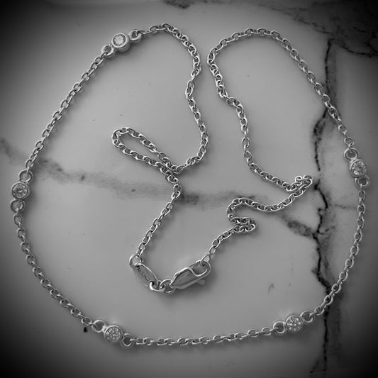 Necklace with 5x3mm, 0.10ct. Diamonds.