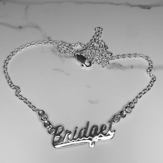 Name Chain framed with 2x2.5mm, 0.06ct. Diamonds.