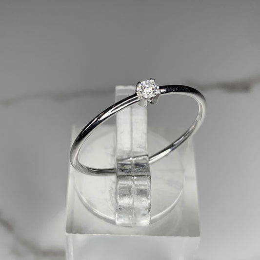Solitaire Ring with 2.5mm, 0.06ct. Diamond with plain band.