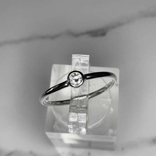 Solitaire Ring with 3mm, 0.10ct.  Bezel set Diamond